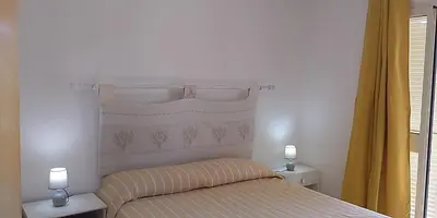Letto o letti in una camera di Casa Marconi