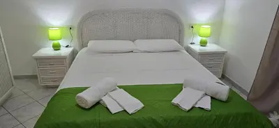 Letto o letti in una camera di Casa Vacanze Dora