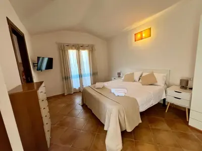 Letto o letti in una camera di Villa Sunrise