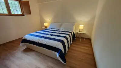 Letto o letti in una camera di APPARTAMENTO San TEODORO