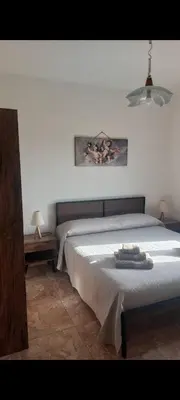 Letto o letti in una camera di Appartamento Vacanze