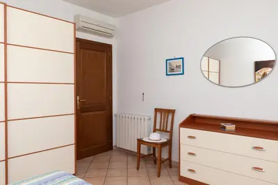 Letto o letti in una camera di Casa delle Vigne by Wonderful Italy