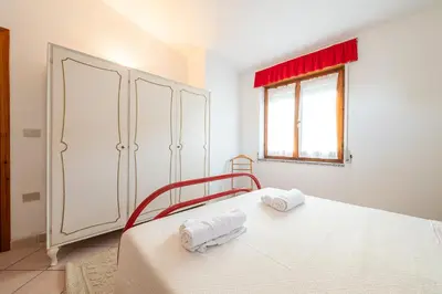 Letto o letti in una camera di Casa Tirso Sardinia Domus