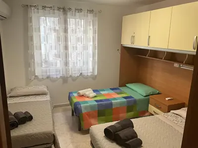 Letto o letti in una camera di Casa Mandoi