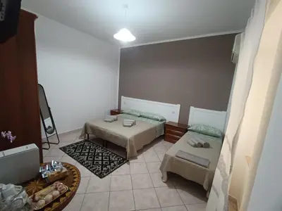 Letto o letti in una camera di Casa Iole