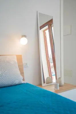 Letto o letti in una camera di AMBRA Holiday Rooms - Rooms & Beach