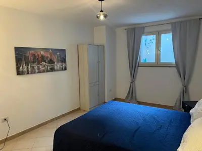 Letto o letti in una camera di Appartamento Cavalluccio
