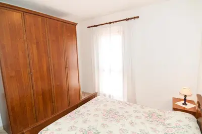 Letto o letti in una camera di Budoni Case Vacanze