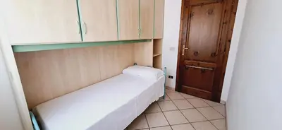 Letto o letti in una camera di Budoni Case Vacanze
