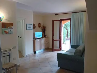 TV o dispositivi per l'intrattenimento presso Suite Sardinia -Appartamento indipendente a Tanaunella