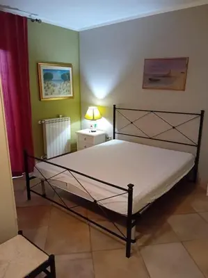 Letto o letti in una camera di Suite Sardinia -Appartamento indipendente a Tanaunella