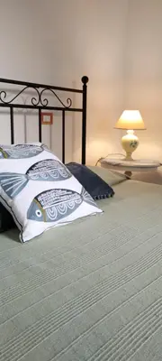 Letto o letti in una camera di Casa Orziadas Pittulongu - Sea View