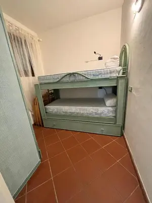 Letto o letti in una camera di Casa Marcella