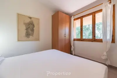 Letto o letti in una camera di L'oasi Panoramica by Propertize - Olbia
