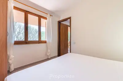 Letto o letti in una camera di L'oasi Panoramica by Propertize - Olbia