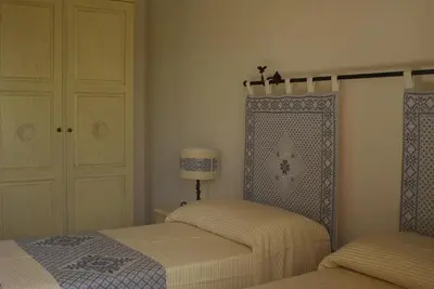 Letto o letti in una camera di B&B Pubulos