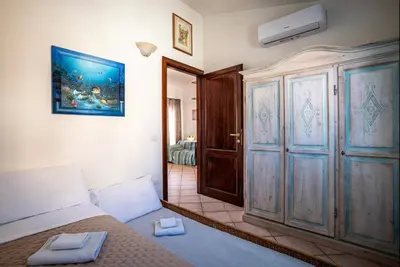 Letto o letti in una camera di Le Vigne - 2 Bathrooms WI-FI & Clima -