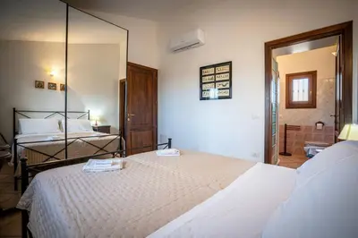 Letto o letti in una camera di Le Vigne - 2 Bathrooms WI-FI & Clima -