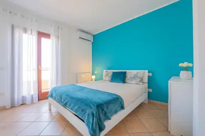Letto o letti in una camera di L'attico di Loredo