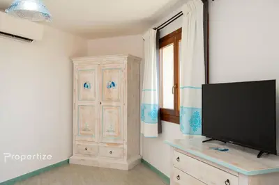 TV o dispositivi per l'intrattenimento presso Villa Azzurra by Propertize