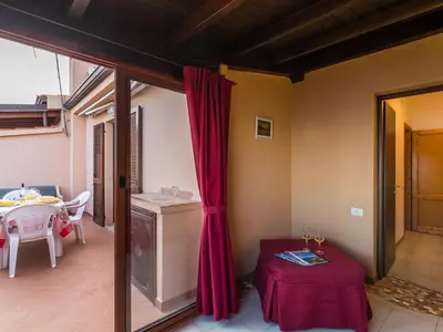 Letto o letti in una camera di Casa a 150 m Dalla Spiaggia