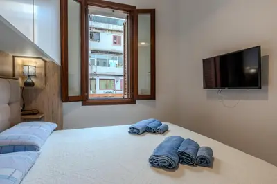 Letto o letti in una camera di Perseo case vacanze Mameli Apartment