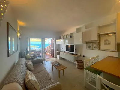 TV o dispositivi per l'intrattenimento presso Trilocale PUNTA EST Vista Mare