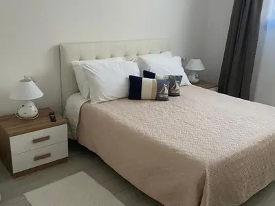 Letto o letti in una camera di Camelia's House