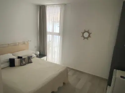 Letto o letti in una camera di Camelia's House