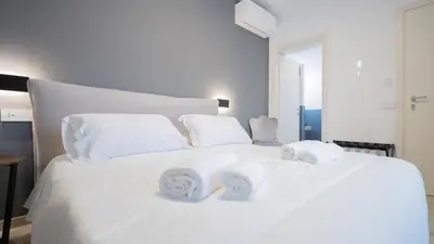 Letto o letti in una camera di Modern Room