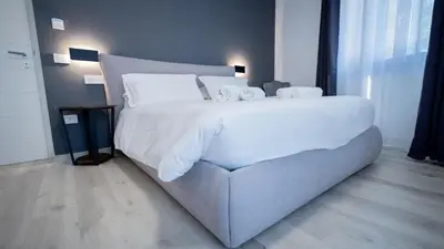 Letto o letti in una camera di Modern Room