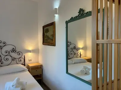 Letto o letti in una camera di Jimy House
