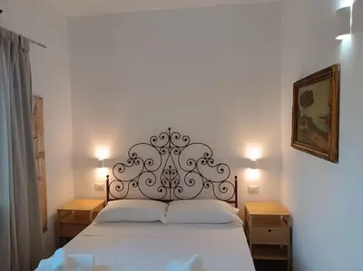 Letto o letti in una camera di Jimy House