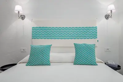 Letto o letti in una camera di Nott'e Die