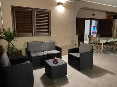 Area soggiorno di Oasy Home sul mare