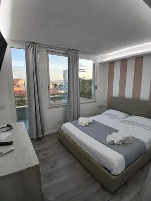 Letto o letti in una camera di Residenza Aura