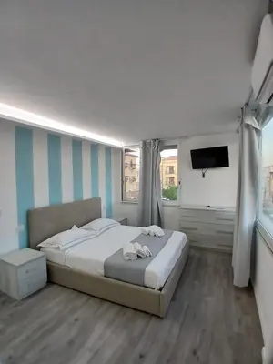 Letto o letti in una camera di Residenza Aura
