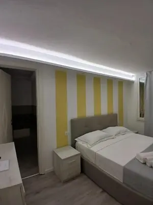 Letto o letti in una camera di Residenza Aura