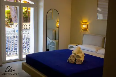 Letto o letti in una camera di Eden affittacamere