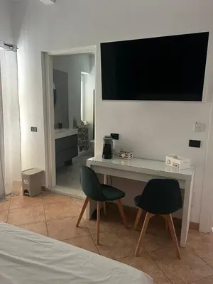 TV o dispositivi per l'intrattenimento presso Crispi Guest House MMG