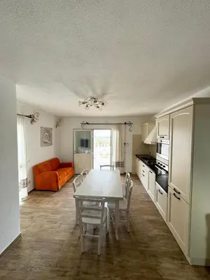 Cucina o angolo cottura di Budoni Residence Lutturai 1