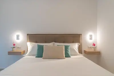 Letto o letti in una camera di Villa Vittorio