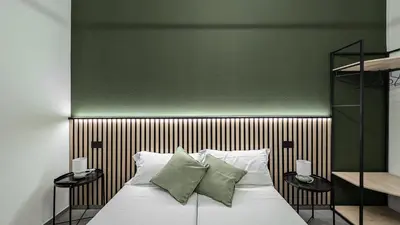 Letto o letti in una camera di DANTE3 - Appartamento moderno in centro