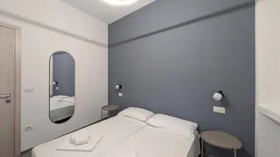 Letto o letti in una camera di DANTE3 - Appartamento moderno in centro