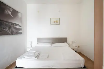 Letto o letti in una camera di Seaview House Cala Gonone