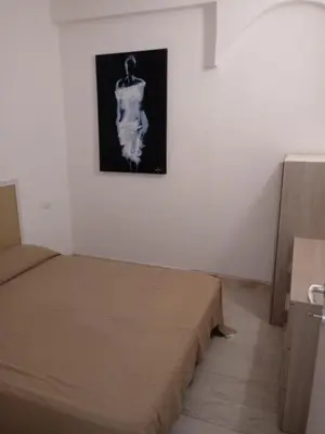 Letto o letti in una camera di Appartamento Su Survaju