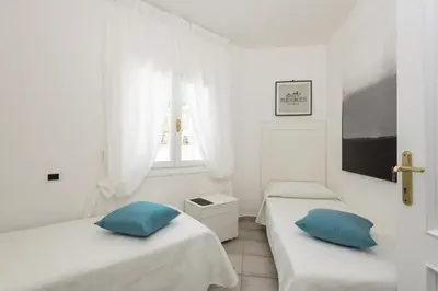 Letto o letti in una camera di S'Abba e Sa Pedra - Your House in Sardinia