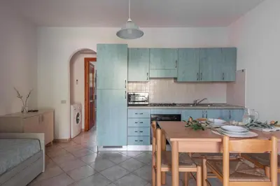 Cucina o angolo cottura di Simple Gem of Le Dimore di Budoni 1 Bedroom B4 Apartment sleeps 4