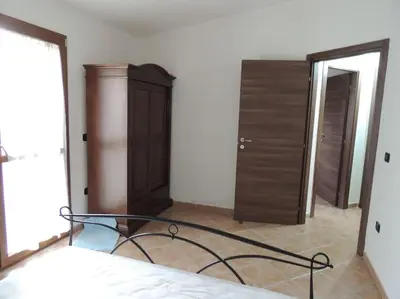 Letto o letti in una camera di Spazioso trilocale - San Lorenzo