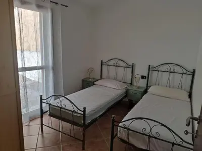 Letto o letti in una camera di Spazioso trilocale - San Lorenzo